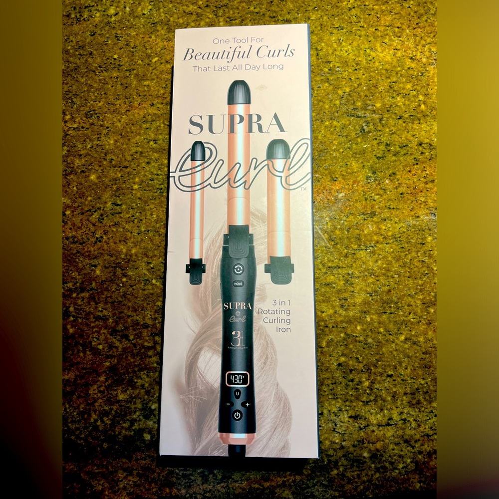 Self rotating curling iron with 3 different barrel sizes